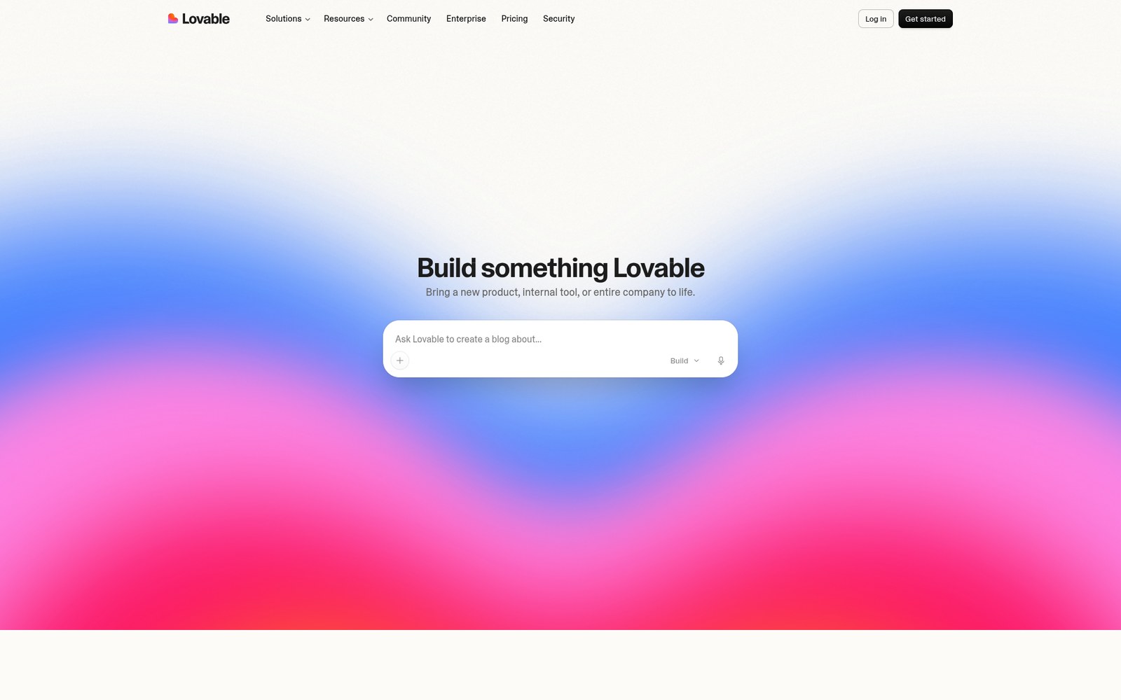 Lovable homepage: the headline reads Build something Lovable, above a prompt box.